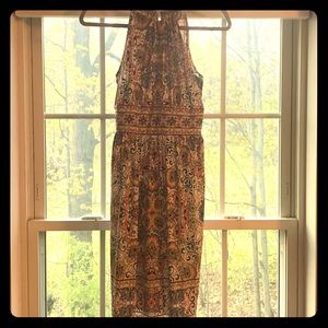 Stretch halter. Oranges, blues, browns and black